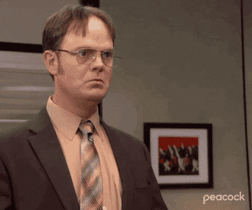 Gif of Dwight from The Office yelling yes several times