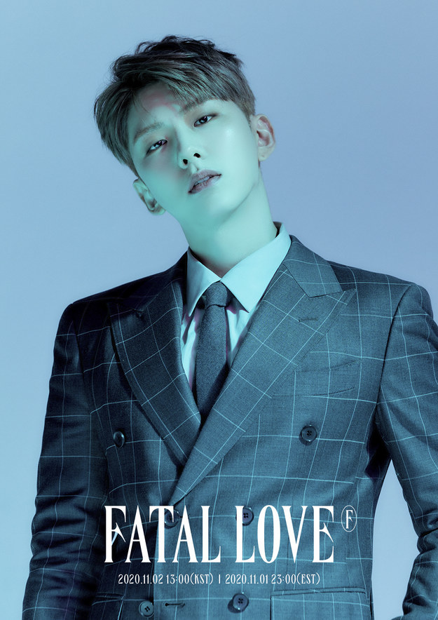 Kihyun poses in a suit