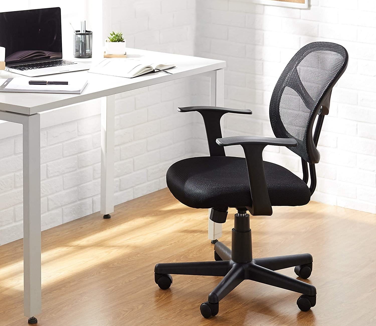 An office chair in front of a desk