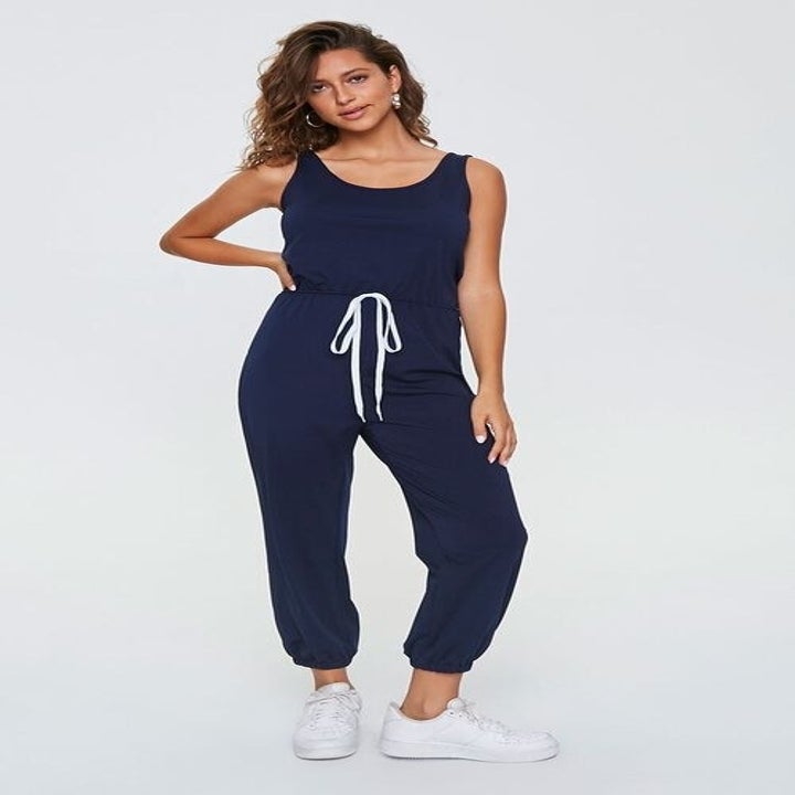 the same model in the jumpsuit in navy
