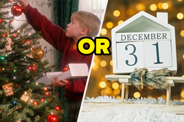 A boy is hanging up decorations on a tree with a December 31 calendar on the right
