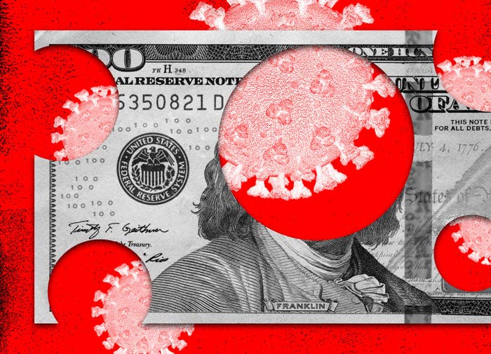 A $100 bill has circles cut out of it, revealing virus cells behind it