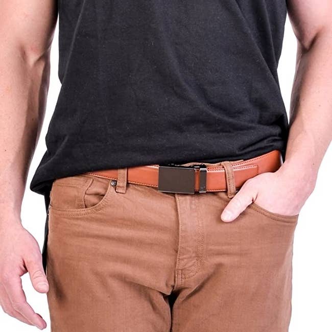 person wearing the belt with pants and a T-shirt