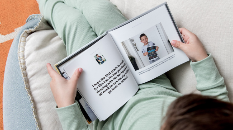 a kid looking through a chatbook