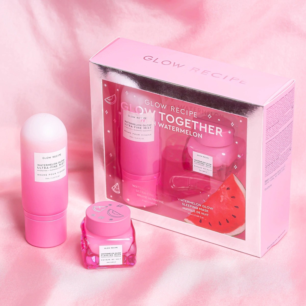 The set with a pink mist spray bottle and a pink jar for the sleeping mask 