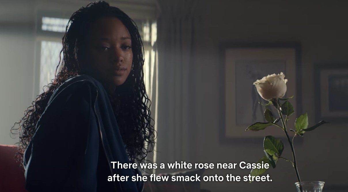 Neveah with white rose. &quot;There was a white rose near cassie after she flew smack onto the street&quot;