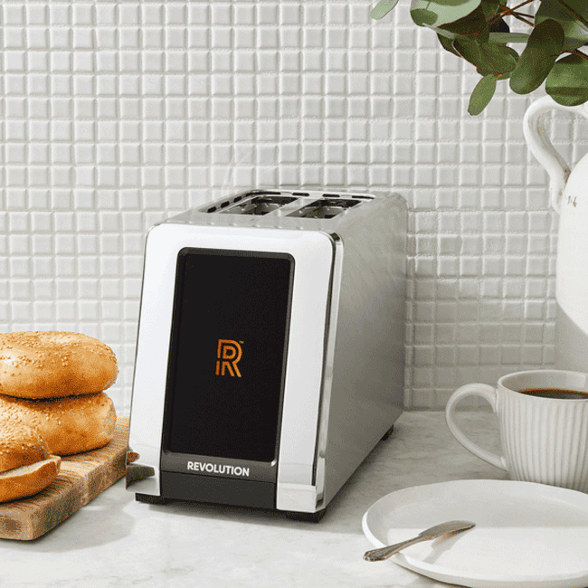 a gif of a model using a touch screen to make bread selections on their toaster