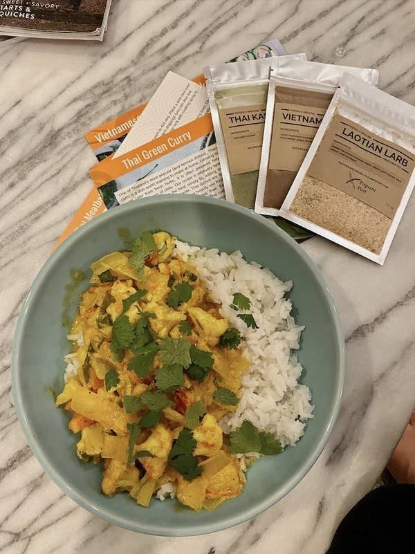 a plate of cauliflower curry and rice made by BuzzFeed Editor Kayla Suazo using the piquant post spices