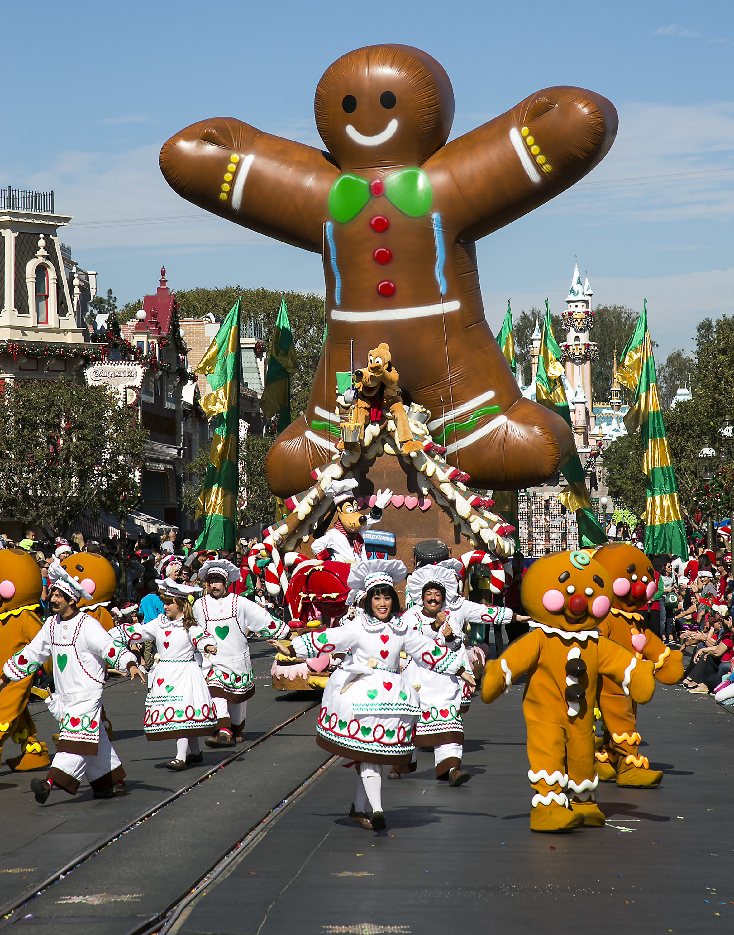 Holiday floats and performers fill Main Street U.S.A at Disneyland