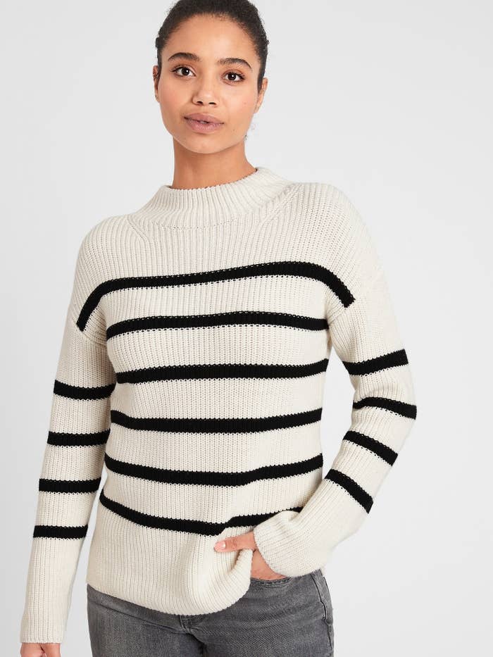 model wearing striped mock neck sweater 