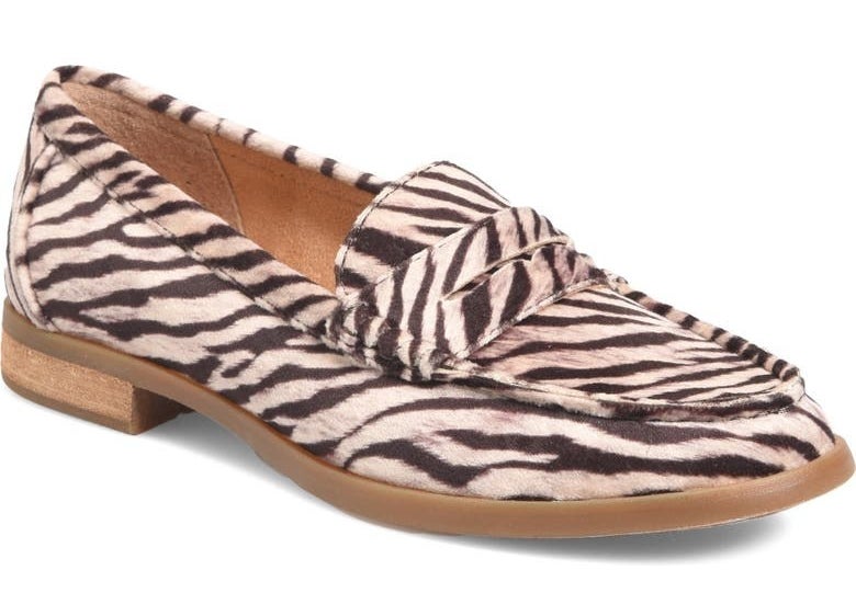 The white and black giraffe-print loafers