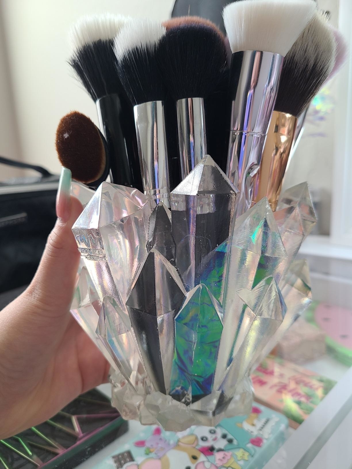 reviewer image of a customer holding up their Wicked Vanity Beauty Crystal Makeup Brush Holder