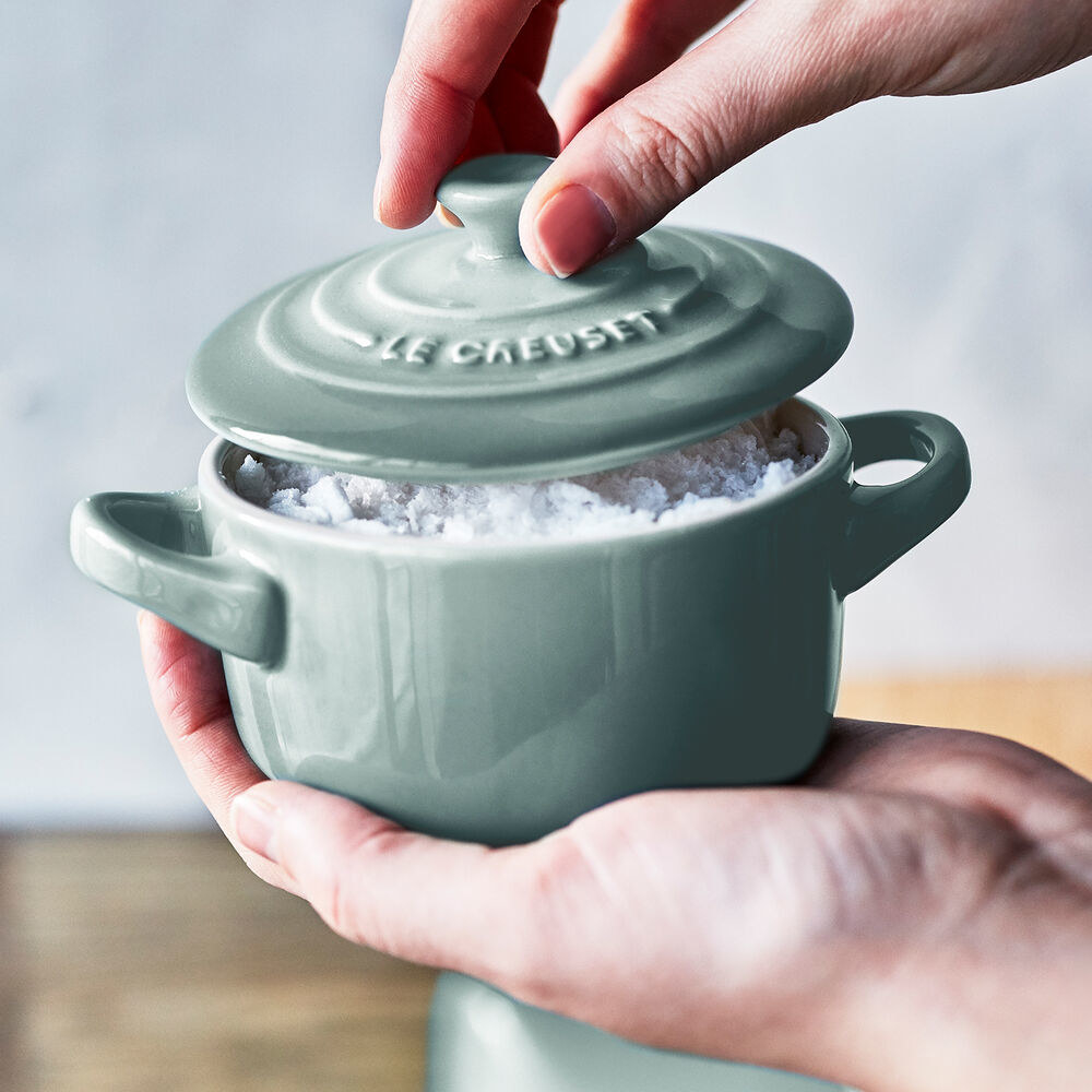 model holding LeCreuset 