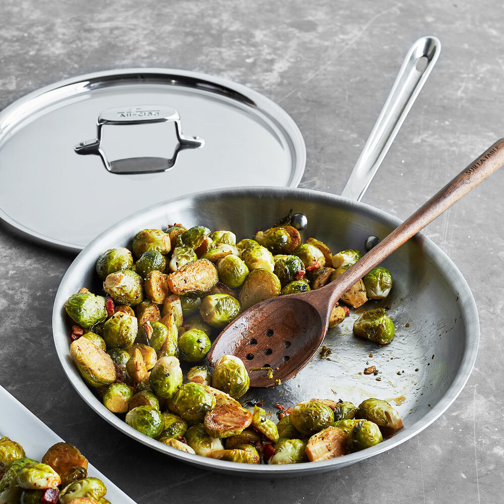 All-Clad stainless steel skillet with brussels sprouts