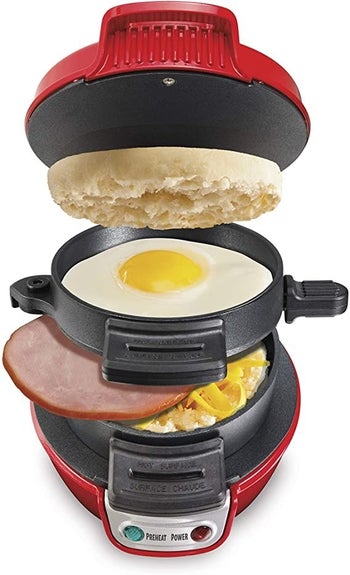 the breakfast sandwich maker with a layer to insert the english muffin, egg, and meat