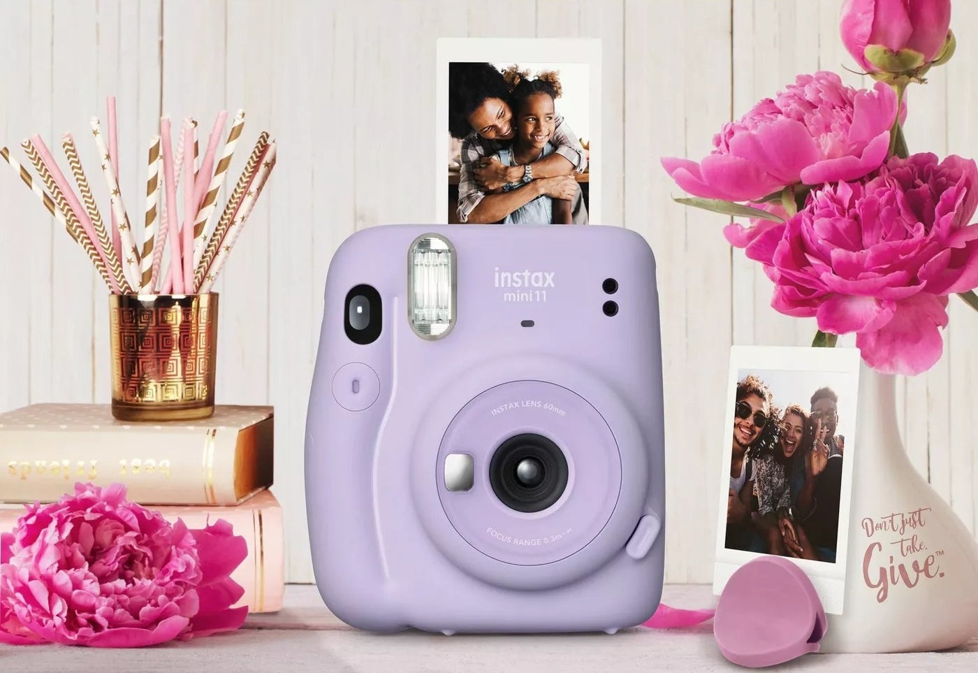 The instax mini 11 camera in purple
