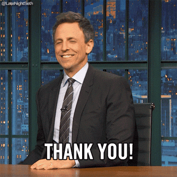 GIF of Seth Meyers using a bullhorn to yell thank you