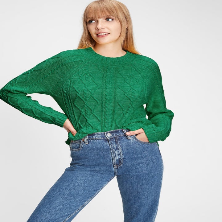 another model in the sweater in kelly green