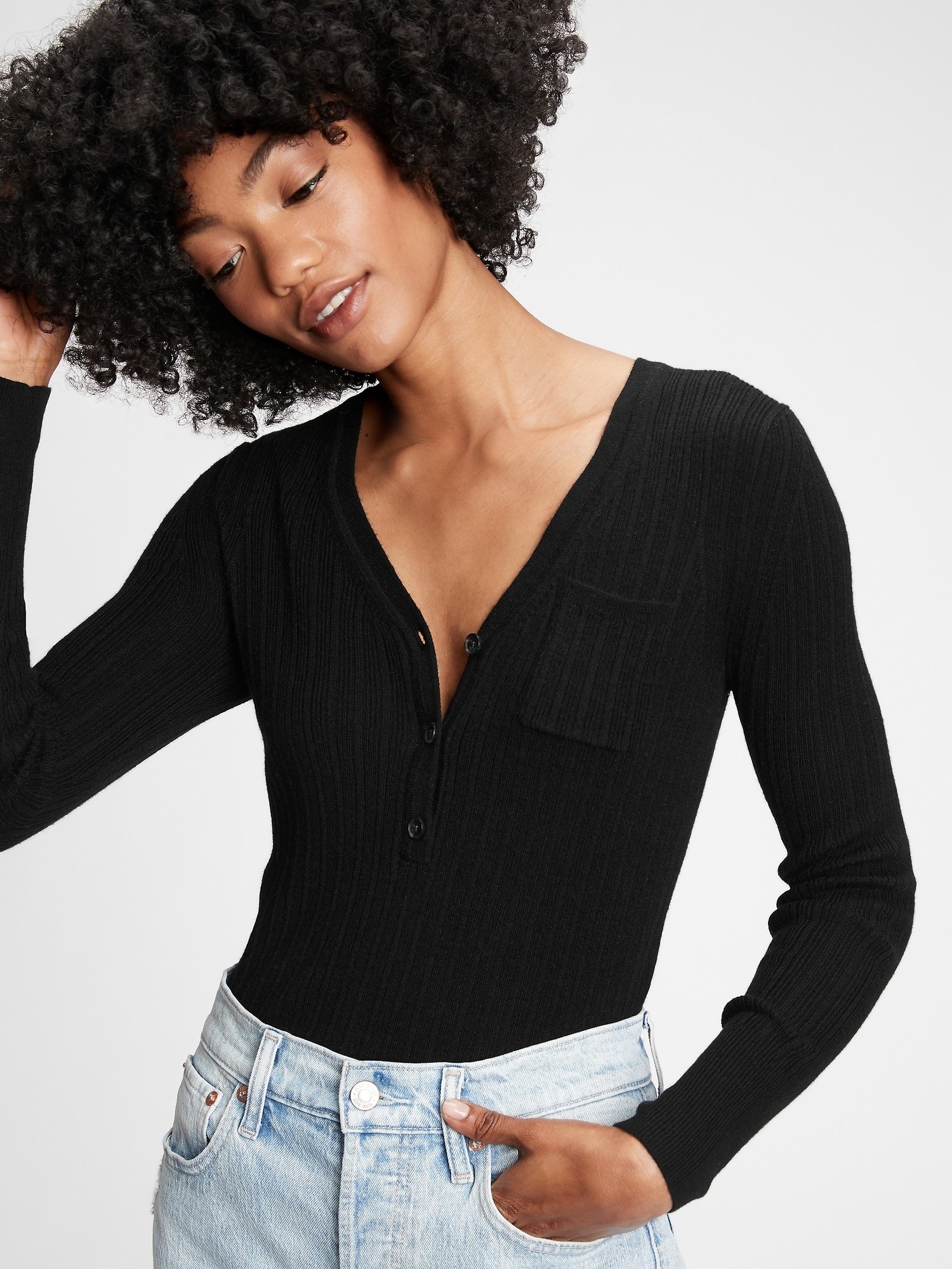 a model in the long sleeve black top