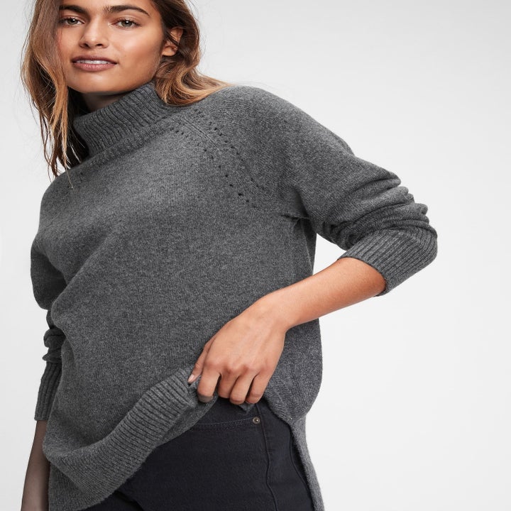 a model in the turtleneck in gray