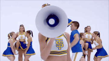 a gif of taylor swift in the shake it off music video