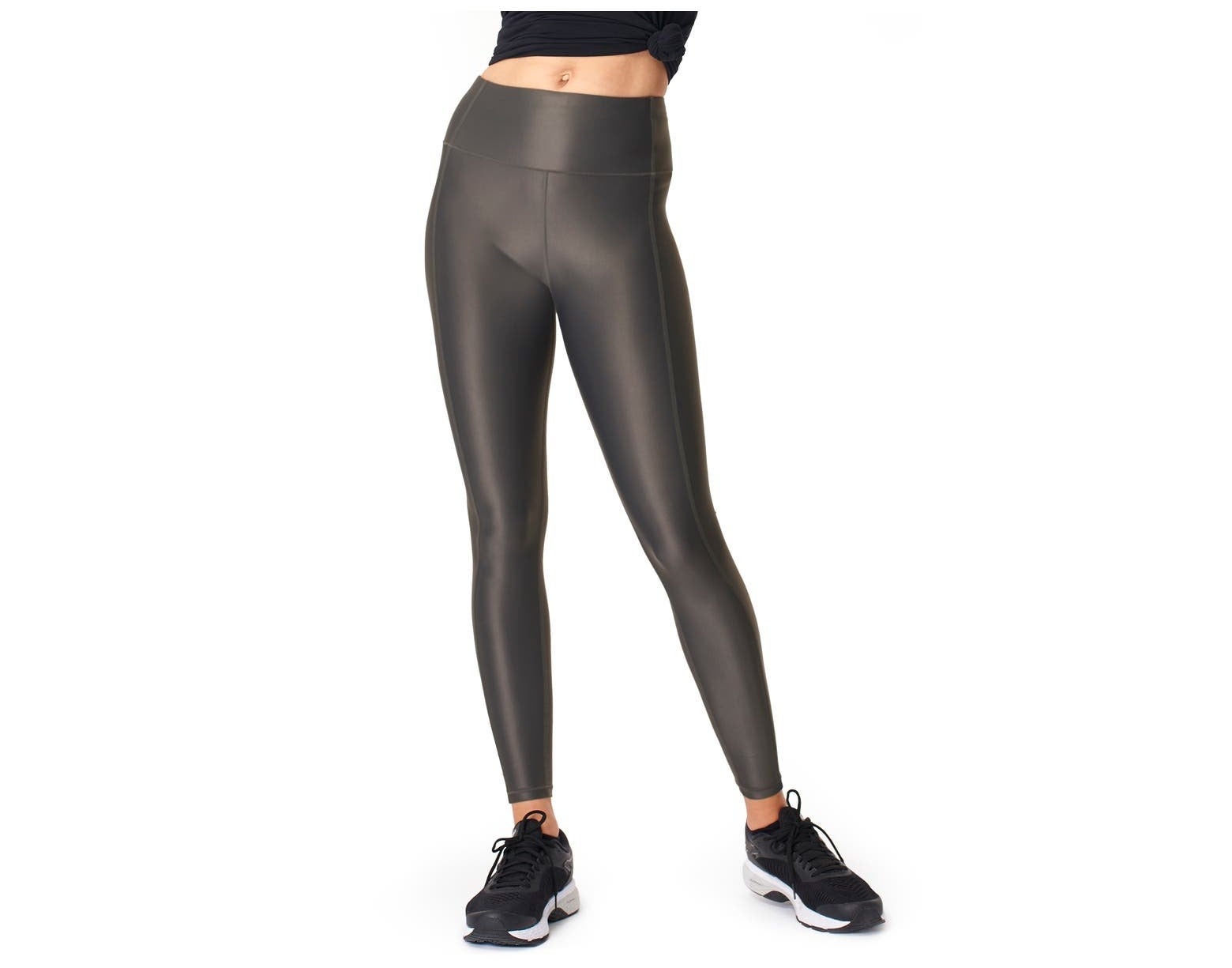 Model wearing the shiny black leggings