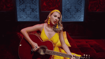 a gif of taylor swift in the lover music video