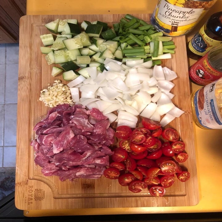 Reviewer using product to cut up vegetables