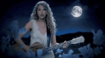 a gif of taylor swift in the fifteen music video