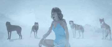 a gif of taylor swift in the out of the woods music video