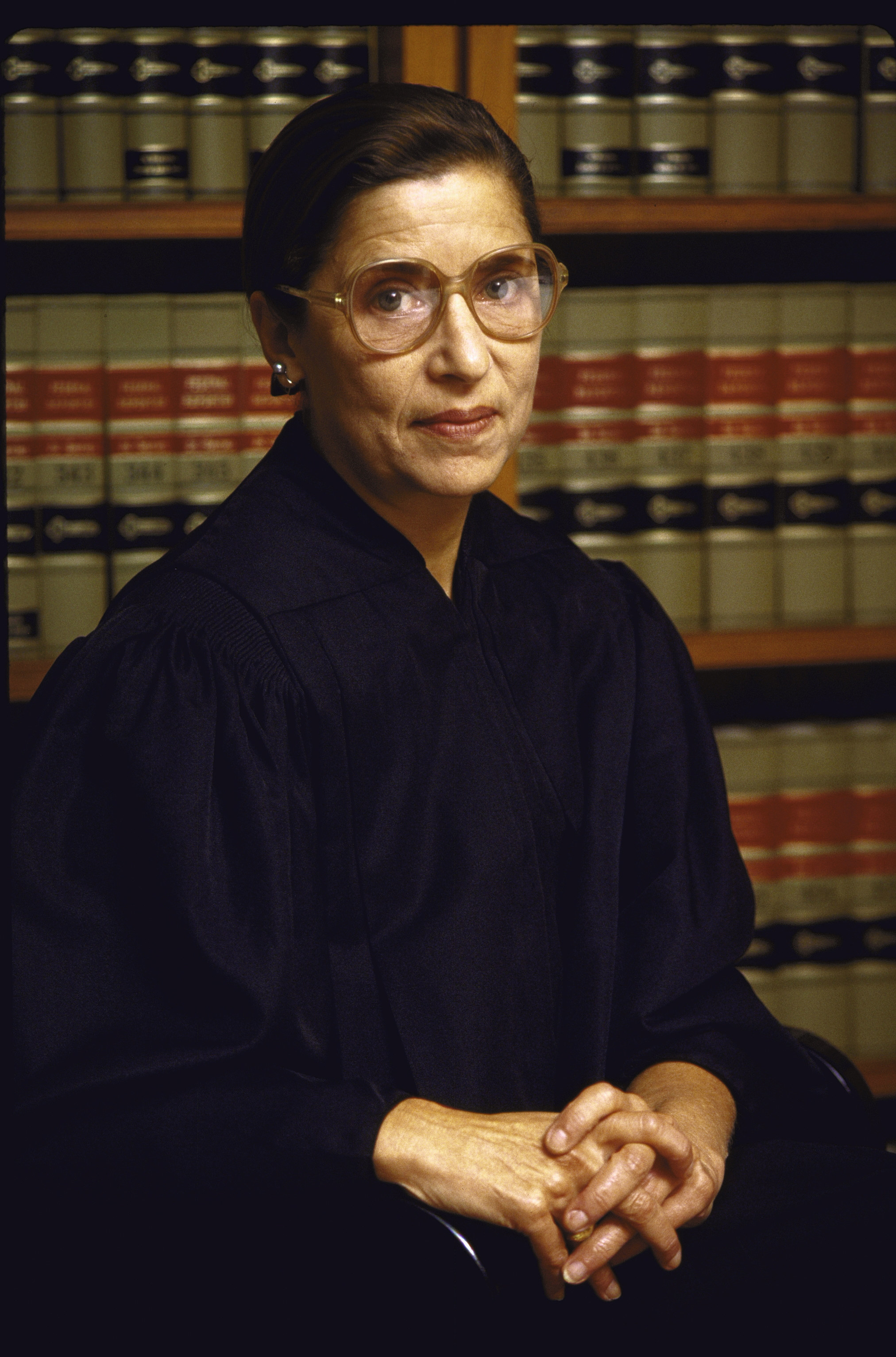 Ginsburg in robes and in front of a bookcase