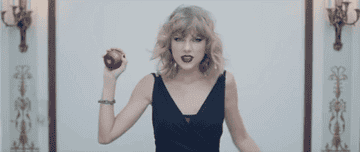 a gif of taylor swift in the blank space music video