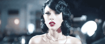 a gif of taylor swift in the wildest dreams music video