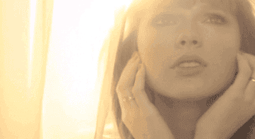 a gif of taylor swift in the highway don&#x27;t care music video