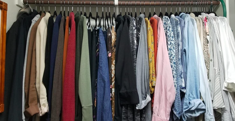 Space-saving velvet clothing hangers in closet