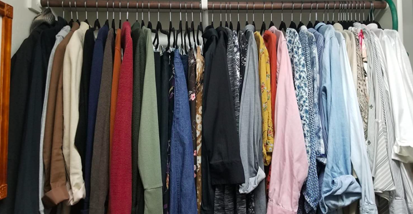 Space-saving velvet clothing hangers in closet 