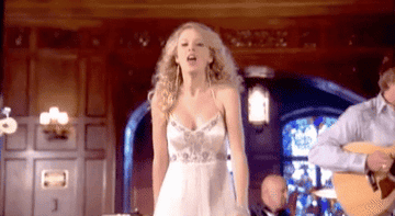 a gif of taylor swift in the change music video