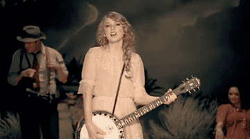 a gif of taylor swift in the mean music video