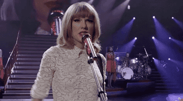 a gif of taylor swift from the red tour official video