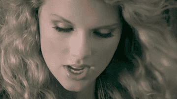 a gif of taylor swift in the tim mcgraw music video
