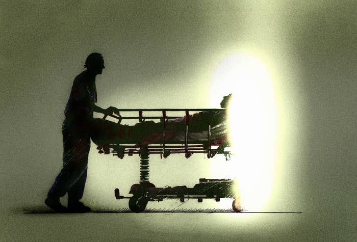 An illustration of a doctor pushing a stretcher into a bright light