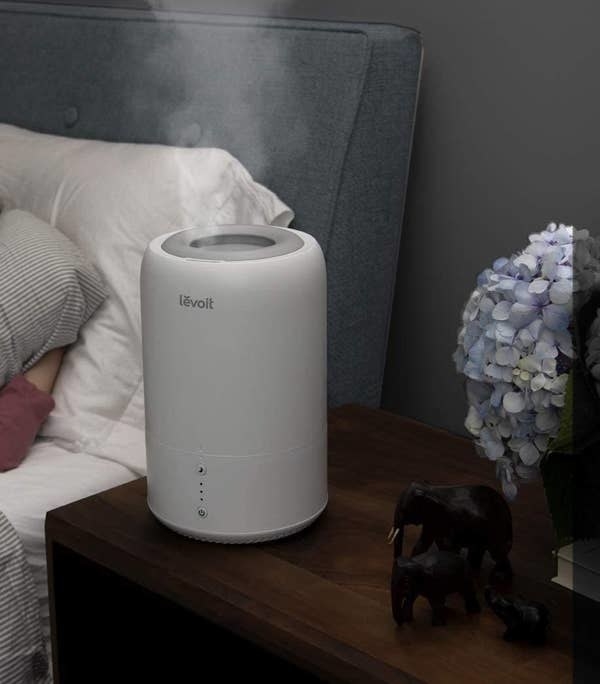 The humidifier on a bedside table