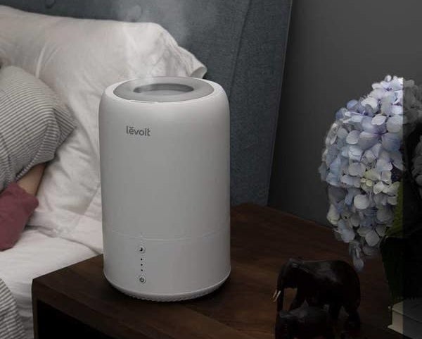 The humidifier on a bedside table