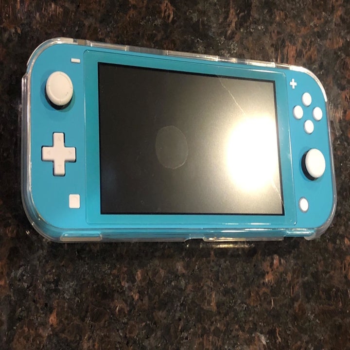 Amazon reviewer photo of Nintendo Switch Lite in plastic case