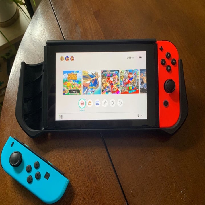 Amazon reviewer photo of Nintendo Switch inside dockable case