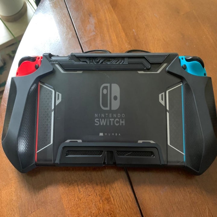 Amazon reviewer photo of Nintendo Switch inside dockable case