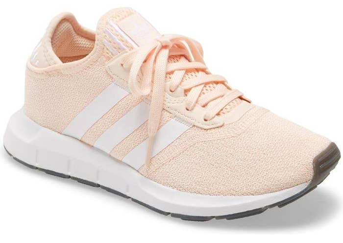 Swift Run X Sneaker in peach with white side stripes and a white sole