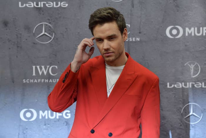 Liam Payne poses on the red carpet prior to the 2020 Laureus World Sports Awards ceremony 