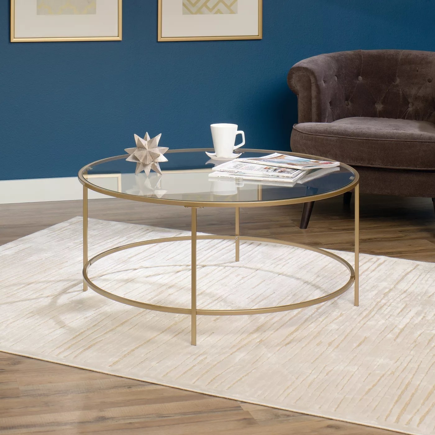 the gold trimmed glass top coffee table 