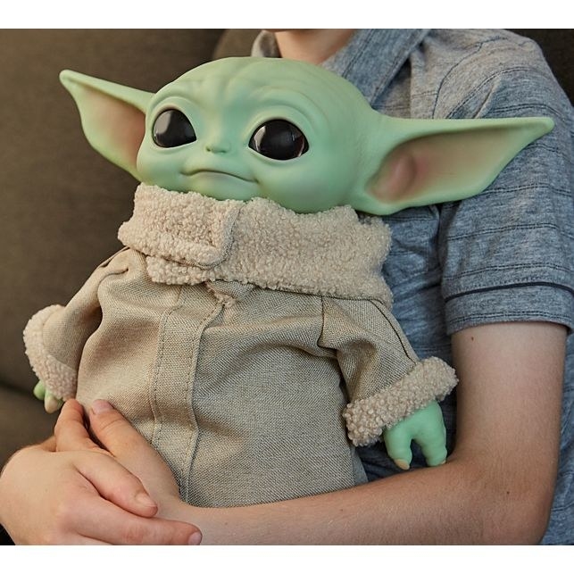 An 11&quot; plush doll of Baby Yoda from The Mandalorian